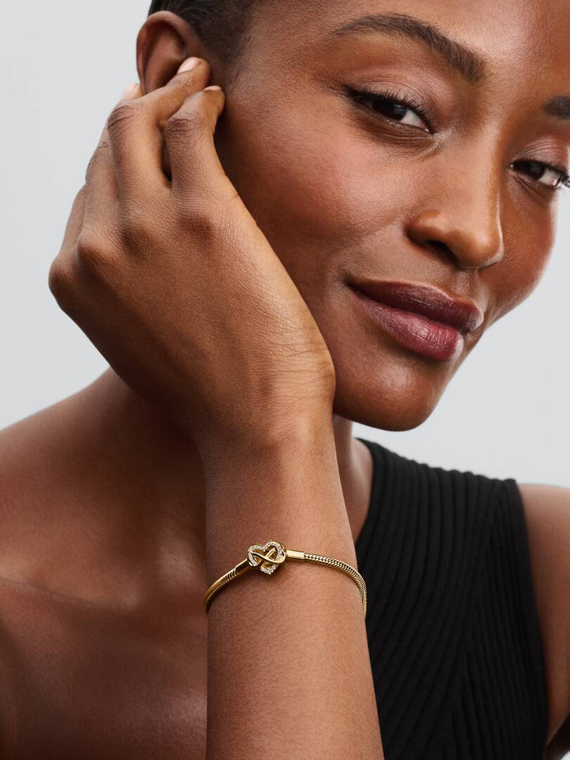 Bracciale Pandora Moments con maglia snake e chiusura a cuore con infinito scintillante