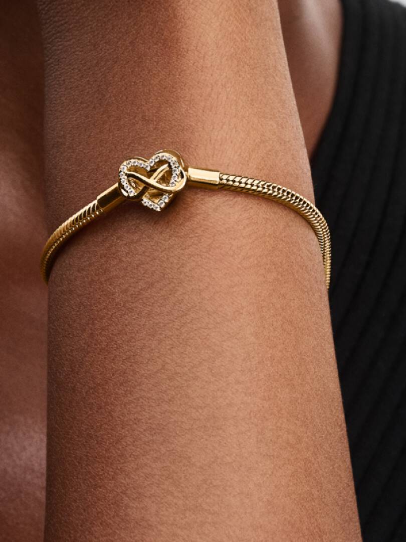 Bracciale Pandora Moments con maglia snake e chiusura a cuore con infinito scintillante